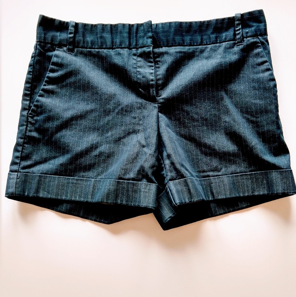 Navy blue and white pin stripped shorts